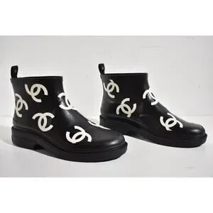 CHANEL | Shoes | Chanel 23a Black White All Over Logo Rubber